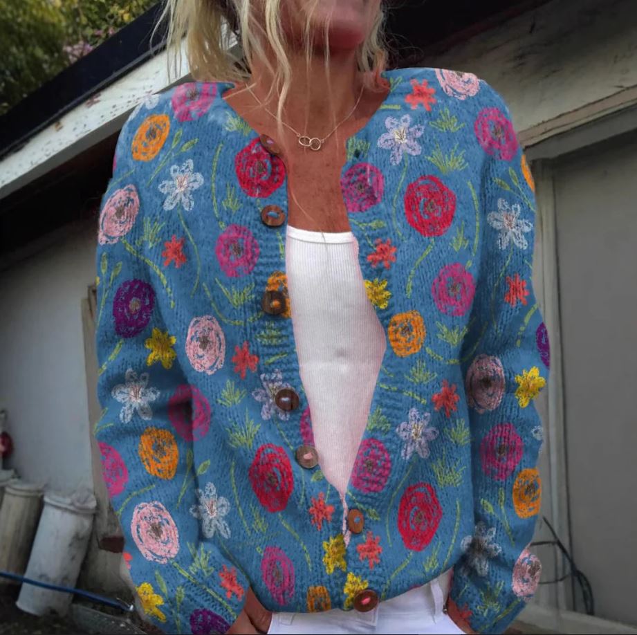 Tilda | Blauw vest met bloemenprint